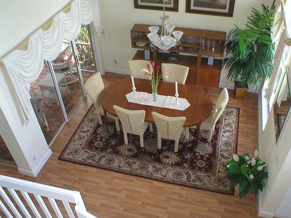 Formal DINING with VAULTED ceilings, Pergo-style Wood floor and Open LR area