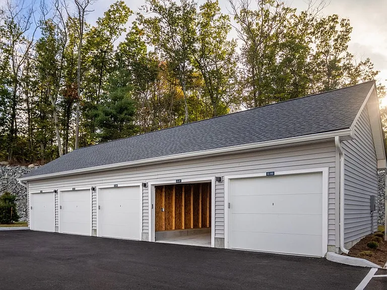 Detached rentable garages with smart features via app to control access including giving others access, alerts, and Amazon Prime delivery