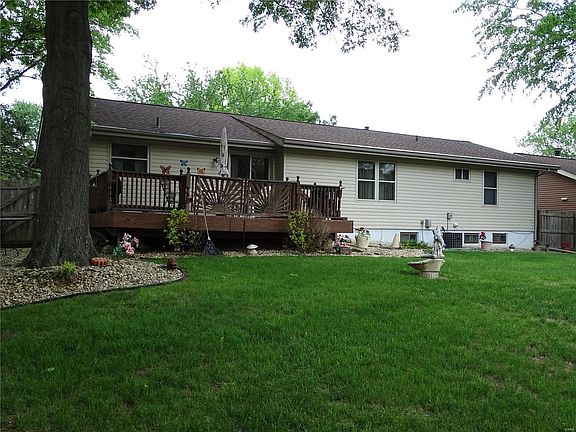 Nice large deck off breakfast room perfect for entertaining or just relaxing while enjoying the outdoors.