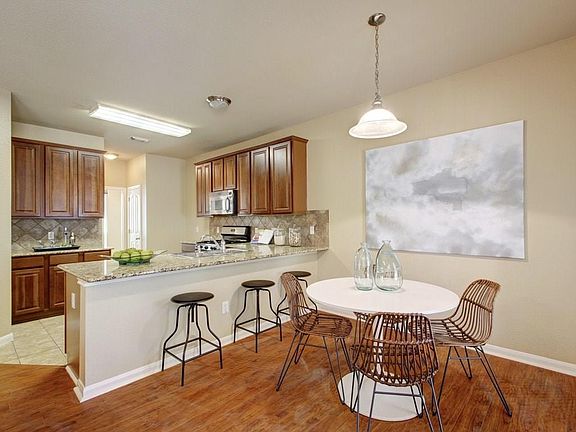Breakfast area and large countertop for maximum versatility, there is also a larger separate dining room on the other side of the kitchen