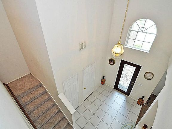 Open 2 story entry with leaded glass front door.