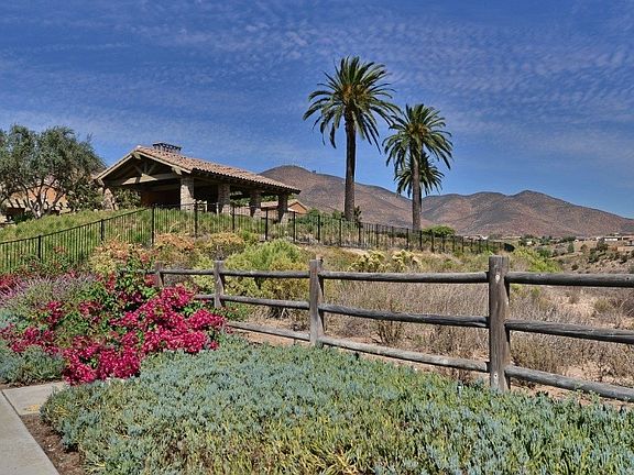 Club House with entertainment areas, multiple pools and playground. Beautiful Views and setting.