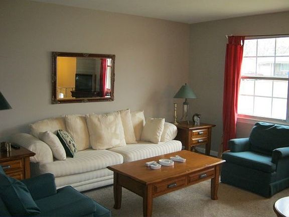 Updated living room with new carpet & paint