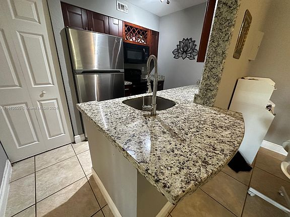 4th image of 2841 N Oakland Forest Dr APT 205