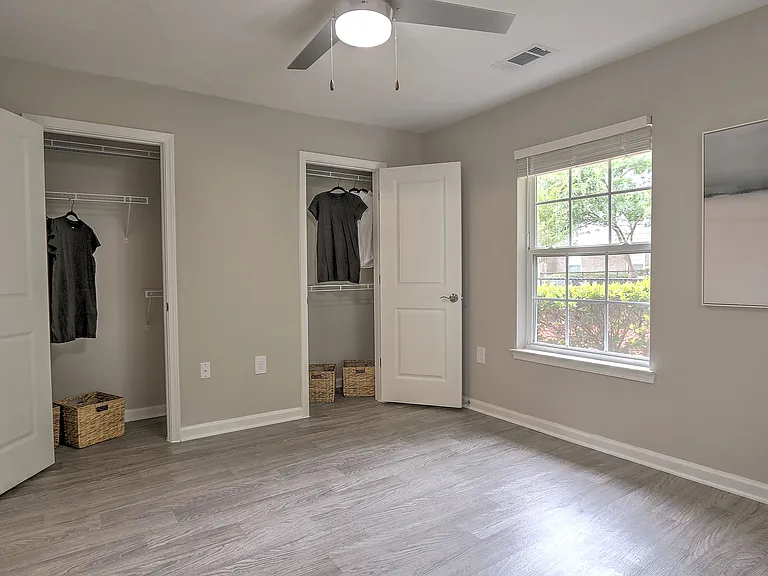 Primary suites feature double walk-in closets with built-in organizers.