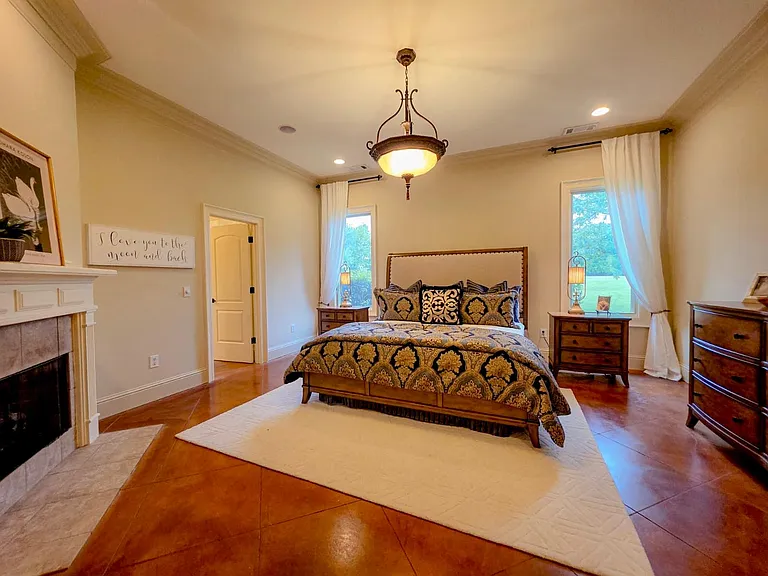 Primary suite with fireplace. Complete privacy, no neighbors behind.