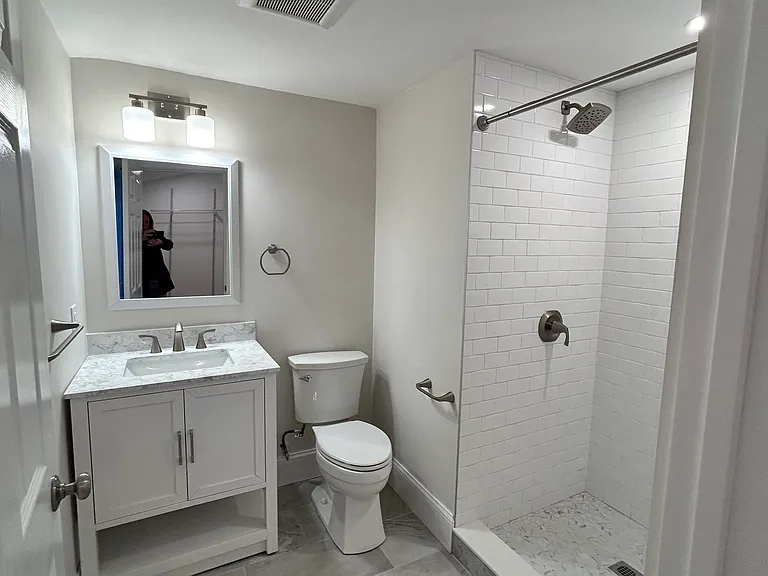 Three bathrooms total, including 2 completely new and one renovated