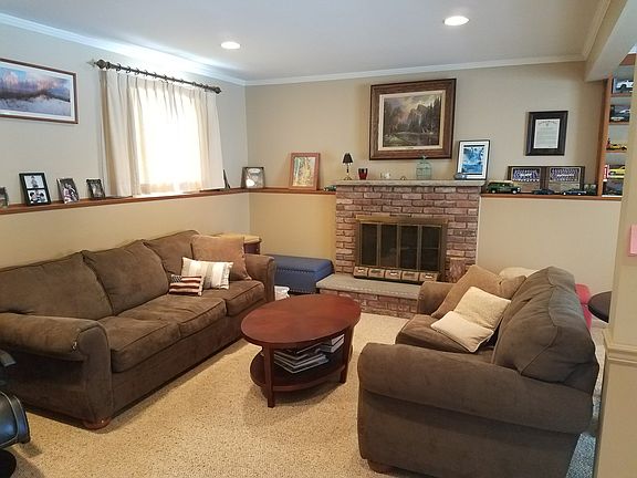 den with fireplace pic 1