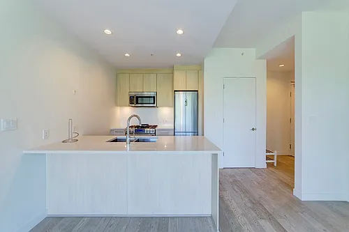 9060 University Cres #1XX Photo 1
