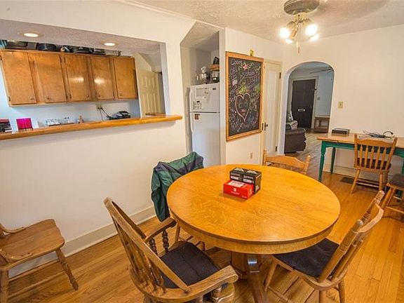 Dining room opens up to kitchen with pass through.