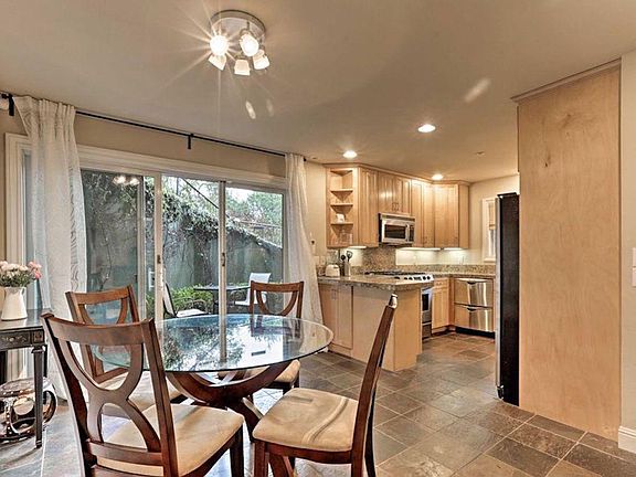 Dinning for four and modern kitchen