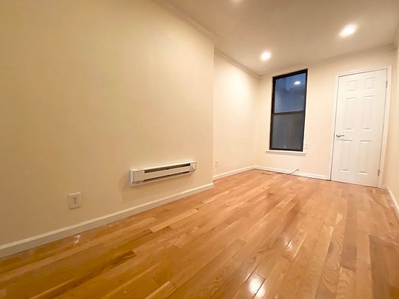 3rd image of 87 E 3rd St APT 10