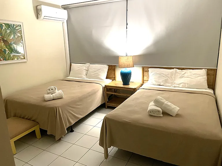 Buena Vida Apartment 102 Bedroom 2 with two Full size beds