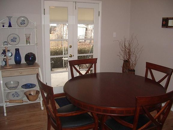 Separate dining room with french doors to back yard