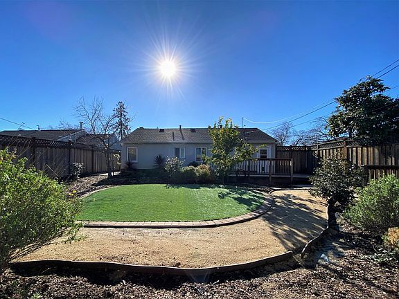 Large fully fenced backyard.