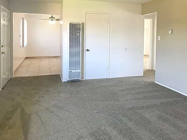 Living room view of entry into dining area
