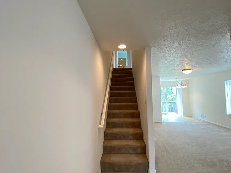 Stairs to upper level.
