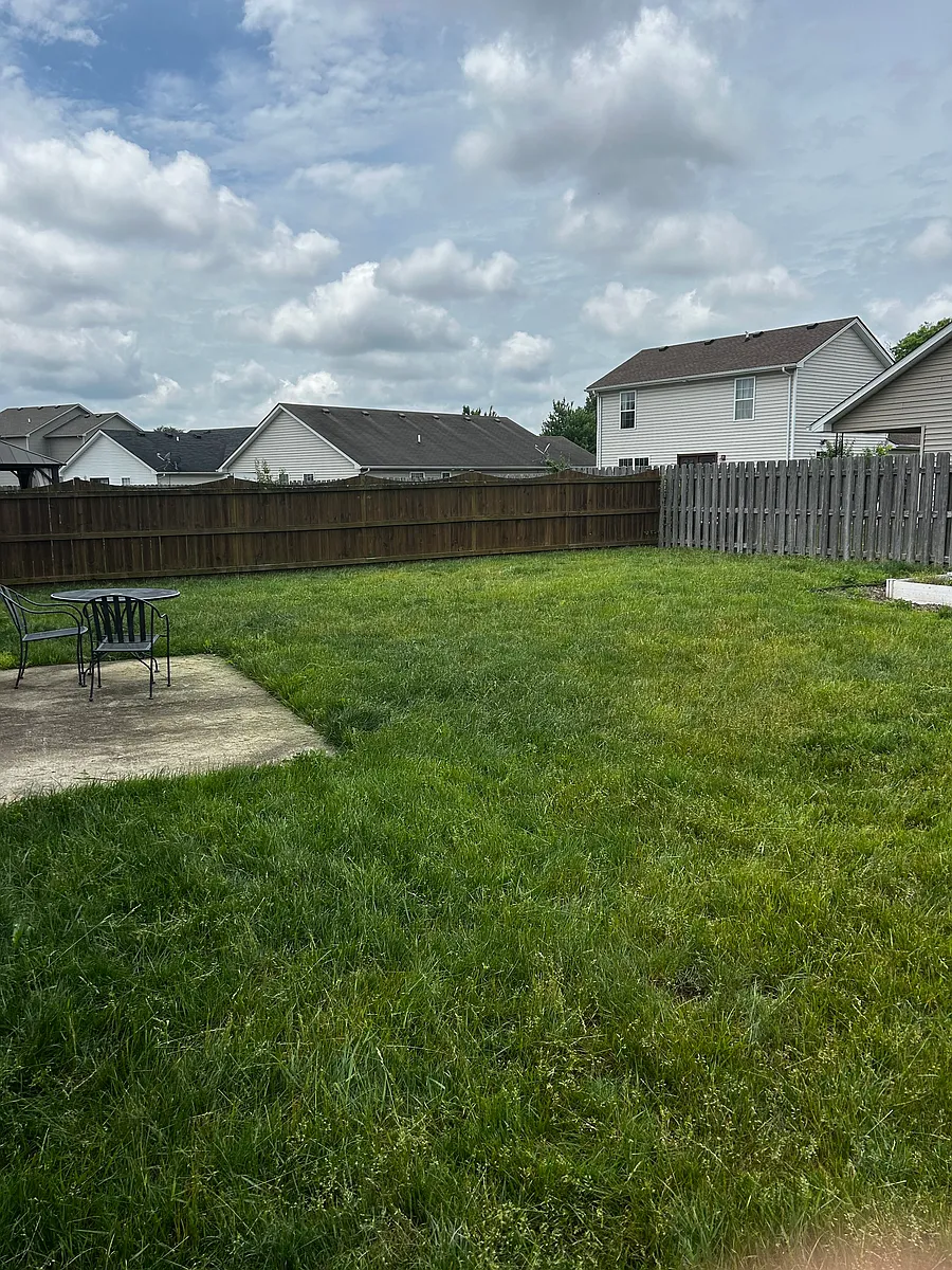 Back yard, patio, tables and 2 chairs. - 441 Julia Way