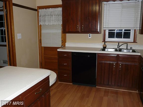 Kitchen with door to decking