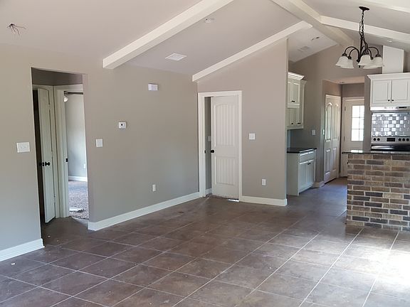exposed beams, tile floor