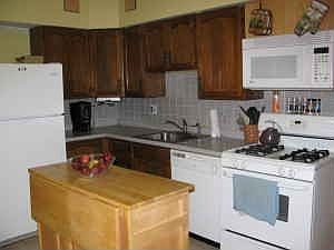 There is a large porch off of kitchen.