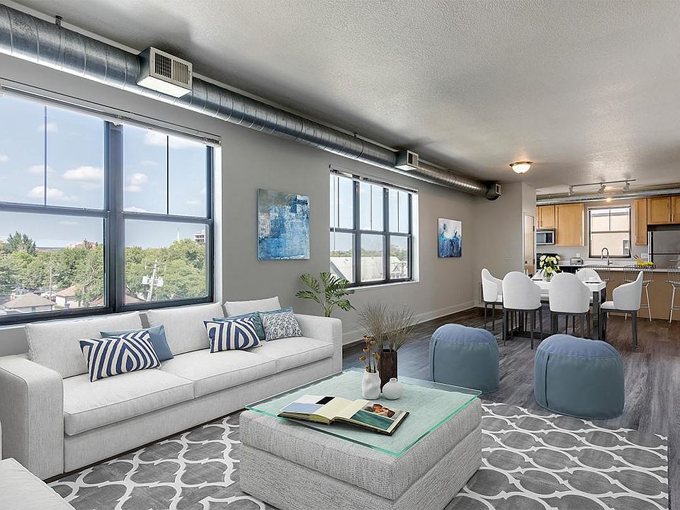 Plenty of natural light coming in through large windows