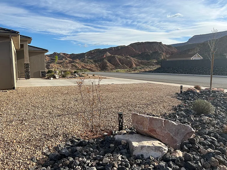 Front side yard with view of red rock hills