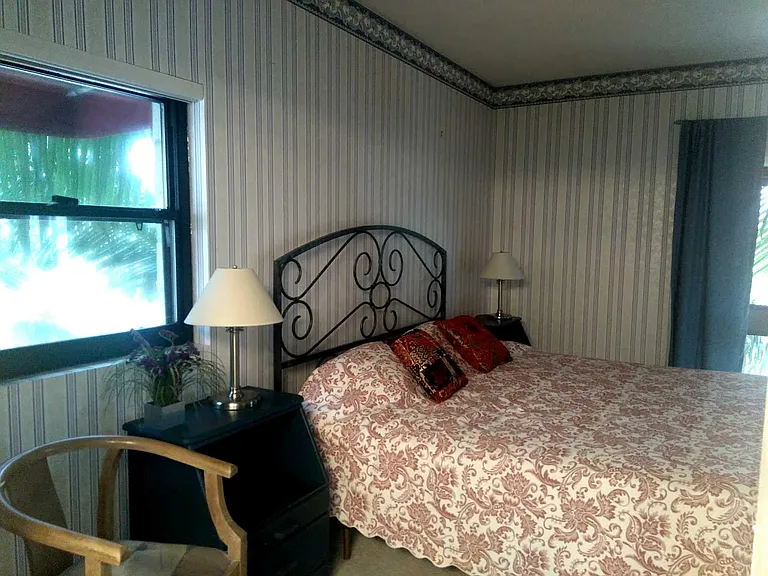 ANOTHER VIEW OF BEDROOM ....ALL WALL PAPER HAS BEEN REMOVED