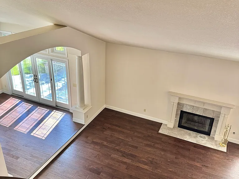 View of the living room and dining room from the second floor