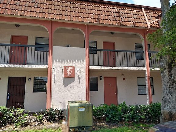 2nd image of 911 NE 209th Ter APT 204