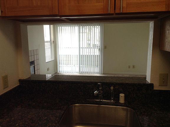 View of Fireplace and Living Room from Kitchen