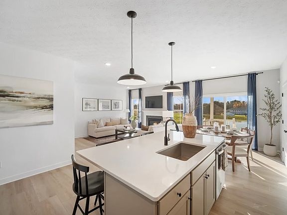 Kitchen with island and pendant lighting