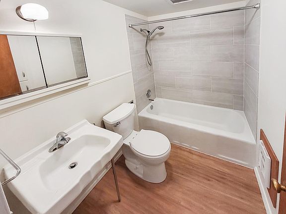 New Tile, Toilet, Faucet and Flooring