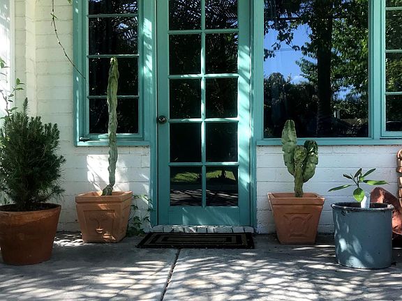 Bedroom door to the backyard.