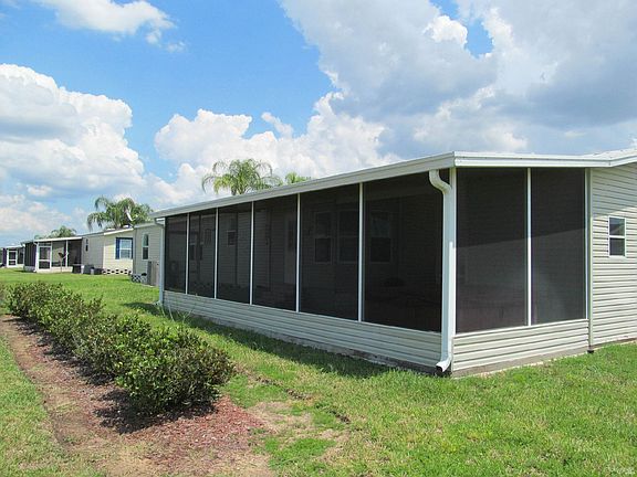 BACK VIEW OF SCREENED LANAI