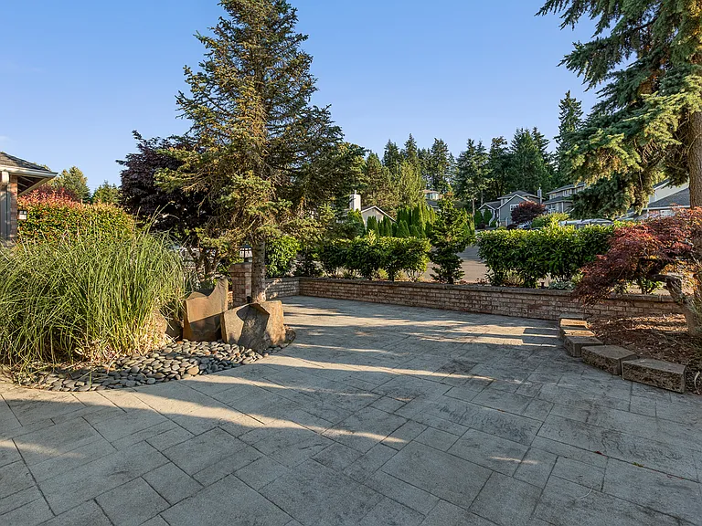Semi-private front courtyard with waterfall feature