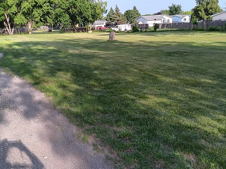 1.3 fenced lot, park like setting.
