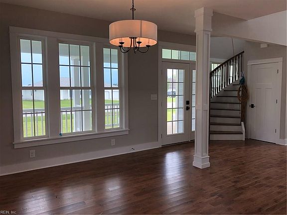 Living room. Lovely hardwood floors.