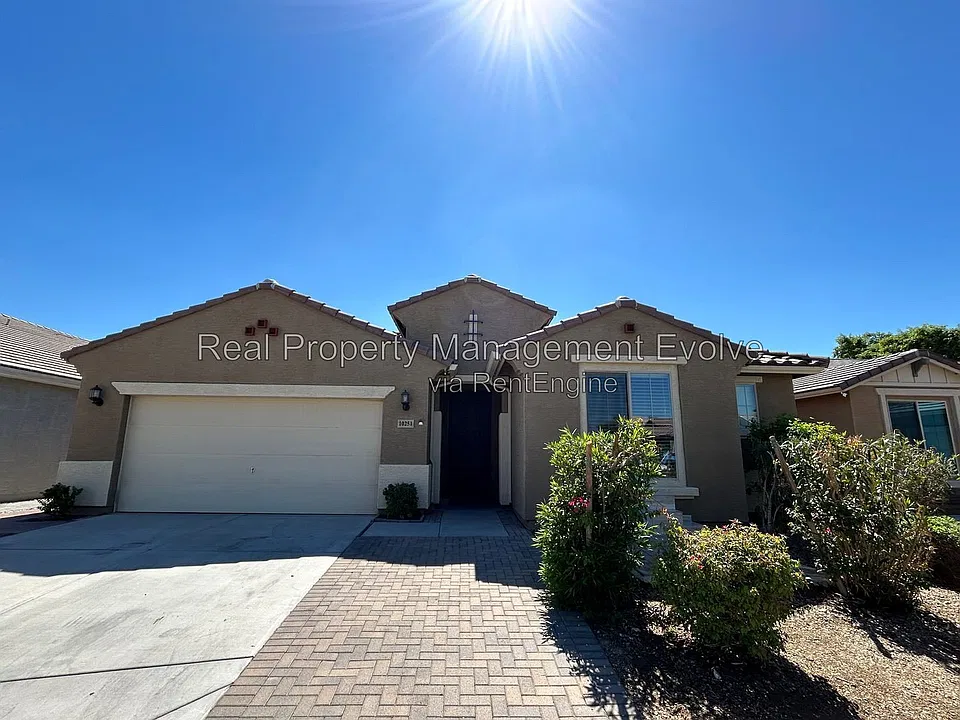 10251 W Lawrence Ln