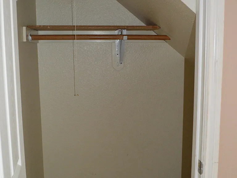 entrance to crawlspace in closet