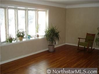 Large window provides great natural lighting in this living room