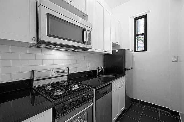 1st image of 245 E 11th St APT 1C