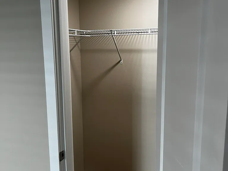 Large walk-in closet in bedroom.