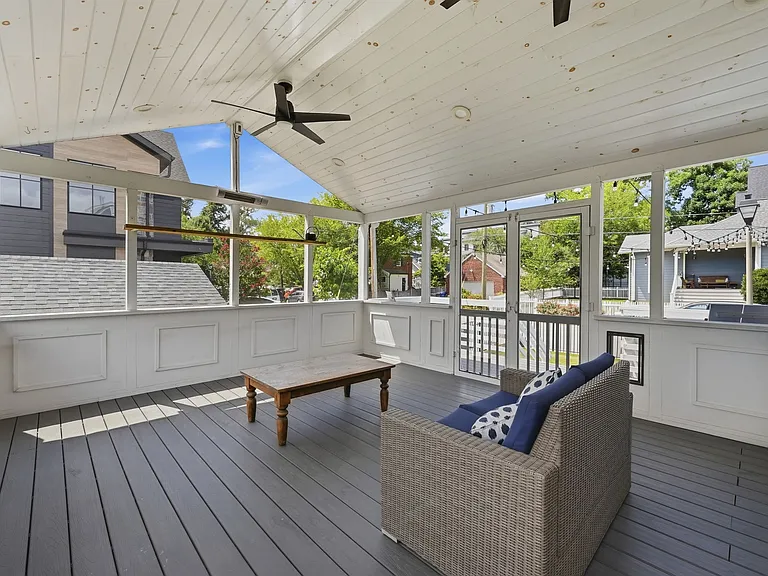 Screened porch perfect for outdoor dining and relaxing