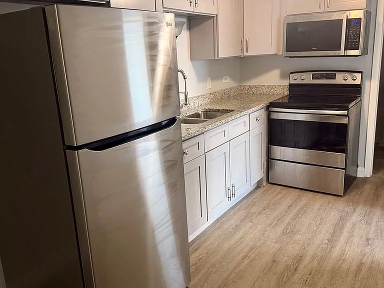 7631 W 63rd Pl — Photo 3