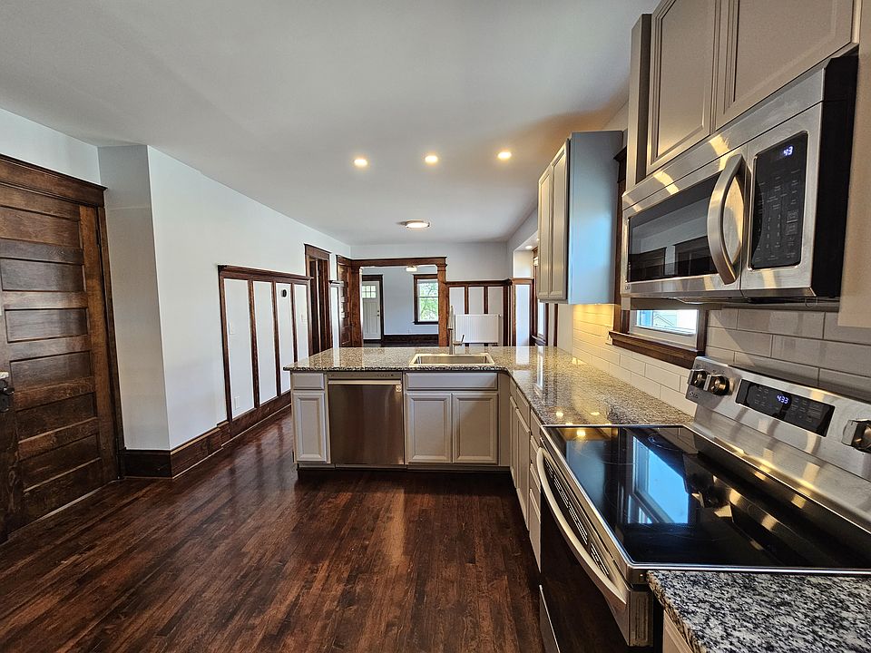 Eat at breakfast bar with plenty of leg space for stools.