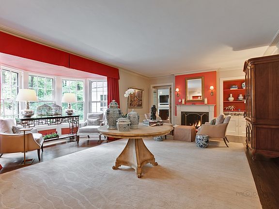A beautiful bay window offers views of the garden