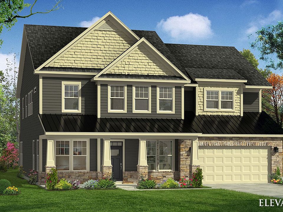 Stonehaven Elevation 5 with partial stone, full front porch, bonus space over 2 car garage.