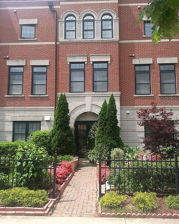 Elegant shrub-lined entrance