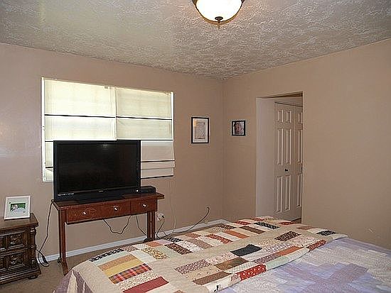 4th image of 10560 S North Forty Way